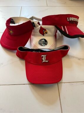 Louisville Cardinal Set of 4 Visors.  1 NWT & 3 EUC